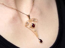 Garnet and Pearl Pendant on neck