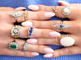 gemstone rings on hand