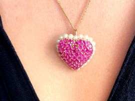 heart pendant on neck