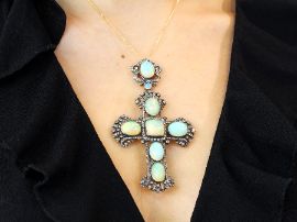 opal cross pendant wearing