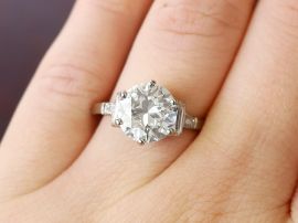 diamond engagement ring on hand