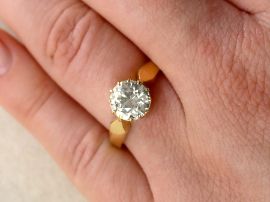 Gold Diamond Solitaire Ring on hand