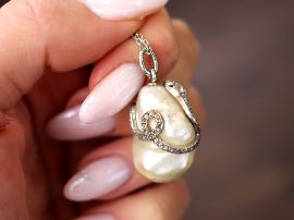 pearl and diamond snake pendant