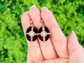 garnet earrings outside