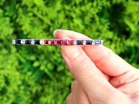 Edwardian Bar Brooch with Sapphires and Rubies outside