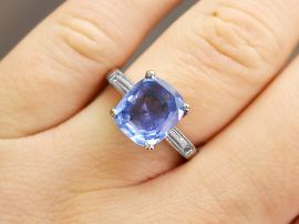 Cushion Cut Sapphire Engagement Ring Platinum on finger