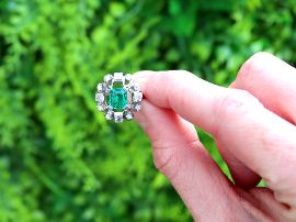 GIA Certified Emerald Ring with Diamonds outside