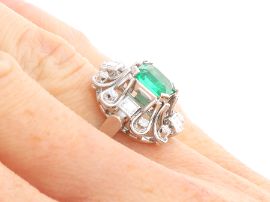 GIA Certified Emerald Ring with Diamonds on hand