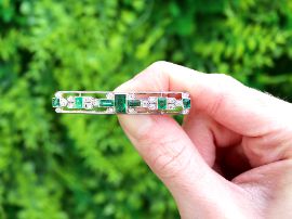 Edwardian Bar Brooch with Emeralds and Diamonds outside