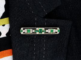 Edwardian Bar Brooch with Emeralds and Diamonds wearing