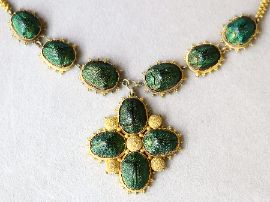 Scarab Beetle Necklace in Yellow Gold outside