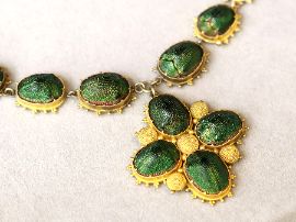 Scarab Beetle Necklace in Yellow Gold outside