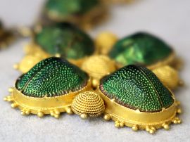 Scarab Beetle Necklace in Yellow Gold outside