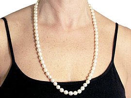 wearing Single Strand Cultured Pearl Necklace