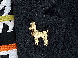 poodle brooch wearing 