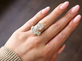 large diamond solitaire and trilogy ring