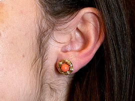 Gold and Coral Stud Earrings wearing