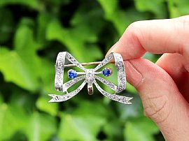 Antique Bow Brooch with Sapphires and Diamonds outside 