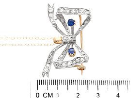 Antique Bow Brooch with Sapphires and Diamonds Ruler