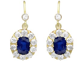 Blue Sapphire Dangle Earrings in Gold