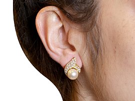 Pearl Cluster Earrings in Gold wearing