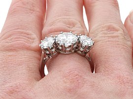 Three Stone Engagement Ring on Finger