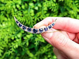 Sapphire Crescent Brooch in Yellow Gold outside