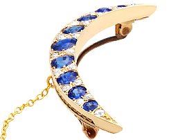 Sapphire Crescent Brooch in Yellow Gold 