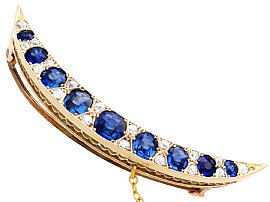 Sapphire Crescent Brooch in Yellow Gold 