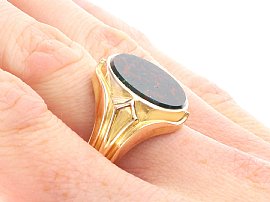 Antique Bloodstone Signet Ring in Yellow Gold on the Hand