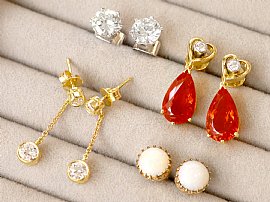 Pear Cut Fire Opal Earrings in Gold