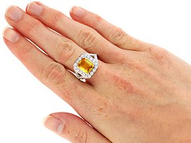 Wearing Emerald Cut Yellow Sapphire Ring with Diamonds