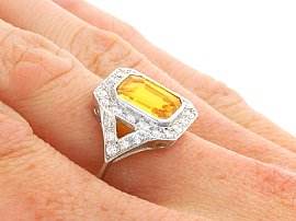 Emerald Cut Yellow Sapphire Ring with Diamonds on hand