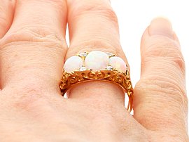 Opal Trilogy Ring in Yellow Gold wearing 