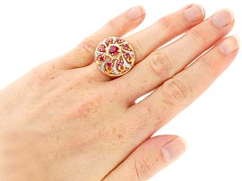 1930s Ruby and Diamond Cocktail Ring in Yellow Gold wearing 