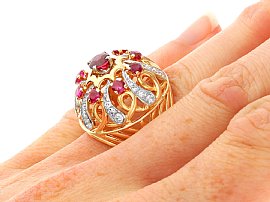 1930s Ruby and Diamond Cocktail Ring in Yellow Gold wearing 