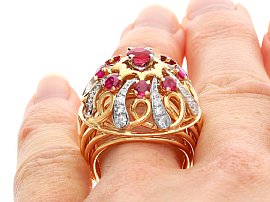 1930s Ruby and Diamond Cocktail Ring in Yellow Gold wearing 