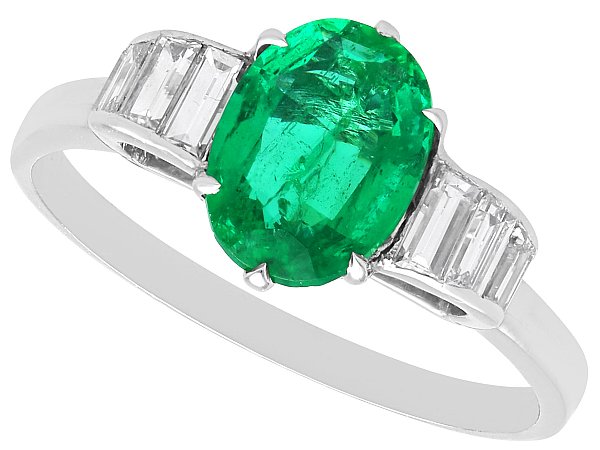 Oval Cut Emerald and Diamond Ring in Platinum