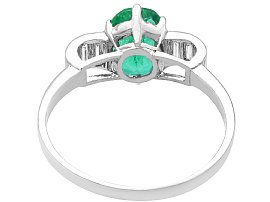 Oval Cut Emerald and Diamond Ring in Platinum