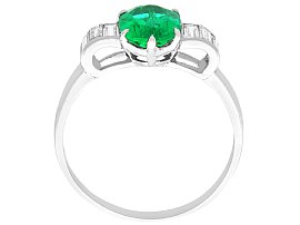 Oval Cut Emerald and Diamond Ring in Platinum