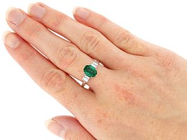 Oval Cut Emerald and Diamond Ring in Platinum