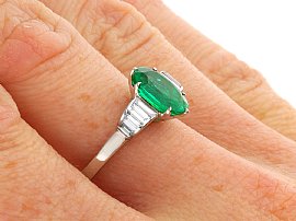 Oval Cut Emerald and Diamond Ring in Platinum