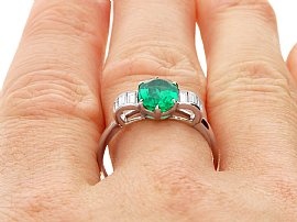 Oval Cut Emerald and Diamond Ring in Platinum