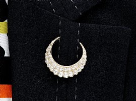 Antique Diamond Crescent Brooch in Gold wearing