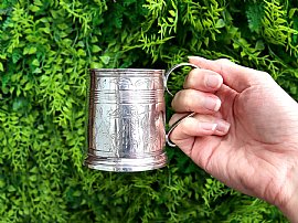 Small Antique Silver Mug outside 