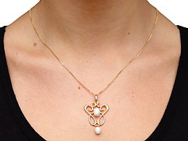 Wearing Gold Opal Pendant Necklace