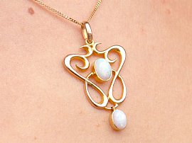 Art Nouveau Opal Pendant in Gold wearing