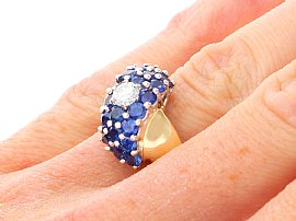 Vintage Sapphire Cluster Ring in Gold Wearing Finger