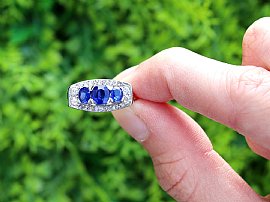 Three Stone Cushion Cut Sapphire Ring with Diamonds