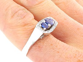 Three Stone Cushion Cut Sapphire Ring with Diamonds wearing